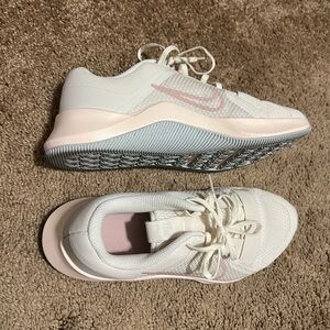 Worn once- Nike’s cross training shoe size 8